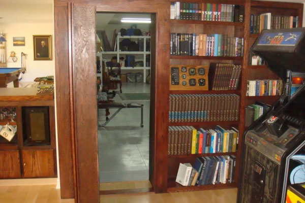 Hidden safe room behind a wooden bookshelf
