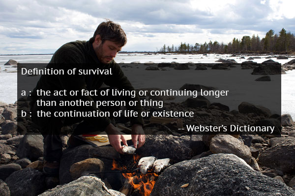 Webster Dictionary definition of survival with man starting fire amongst rocks