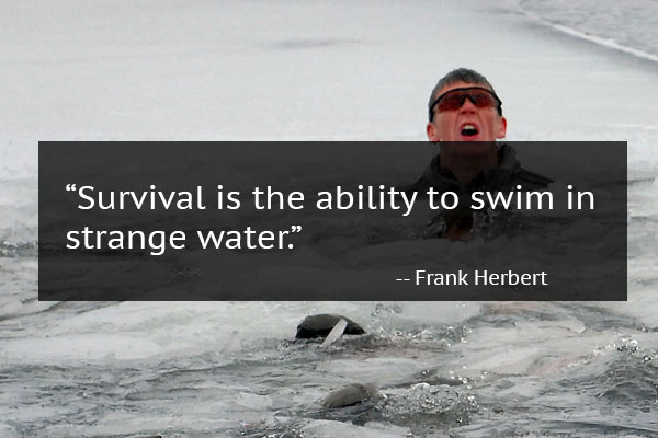 Man swimming in icy water with mindset quote from Frank Herbert
