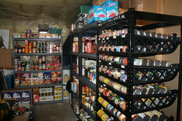 Basement with shelves containing canned food