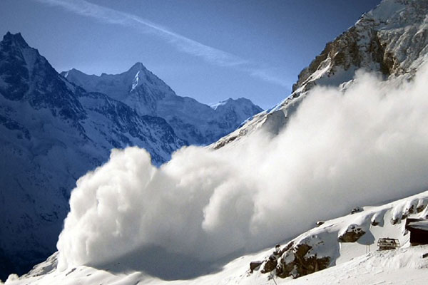 Avalanche on snow covered mountains