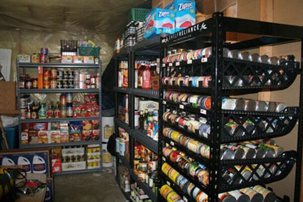 Prepper pantry with shelves holding canned food