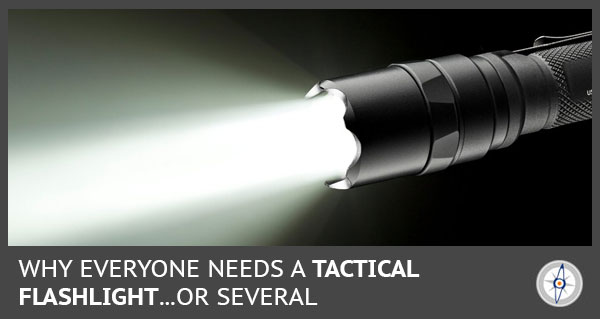 a tactical flashlight turned on shining a beam from right to left side