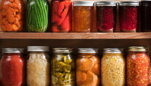 shelves of canned fruits and vegtables