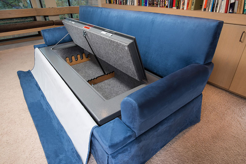 Hidden storage in blue couch