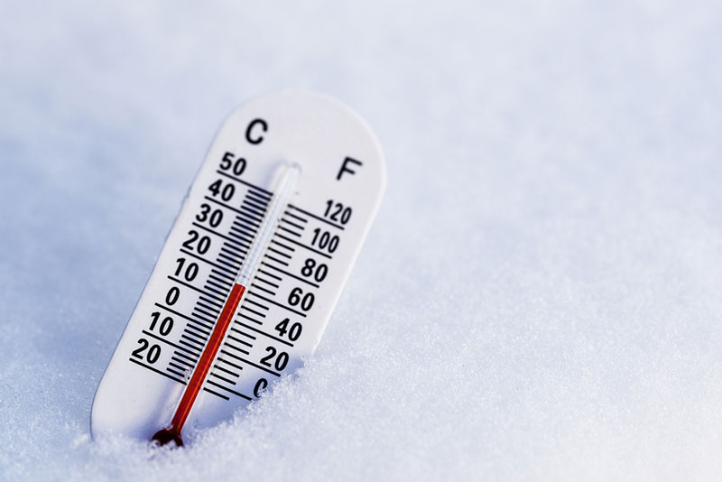 Thermometer buried in snow