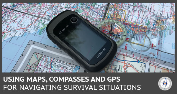 gps device sitting on top of a map with a compass