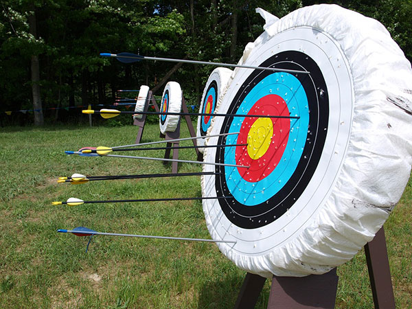 Archery target with arrows