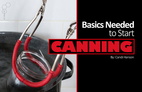 Can being pulled out of a pot of boiling water with canning tongs