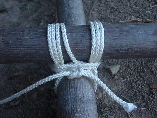 a square lashing holding two timbers together