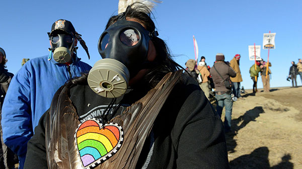 gas mask on protestor