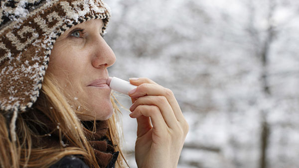 Using chapstick in winter months